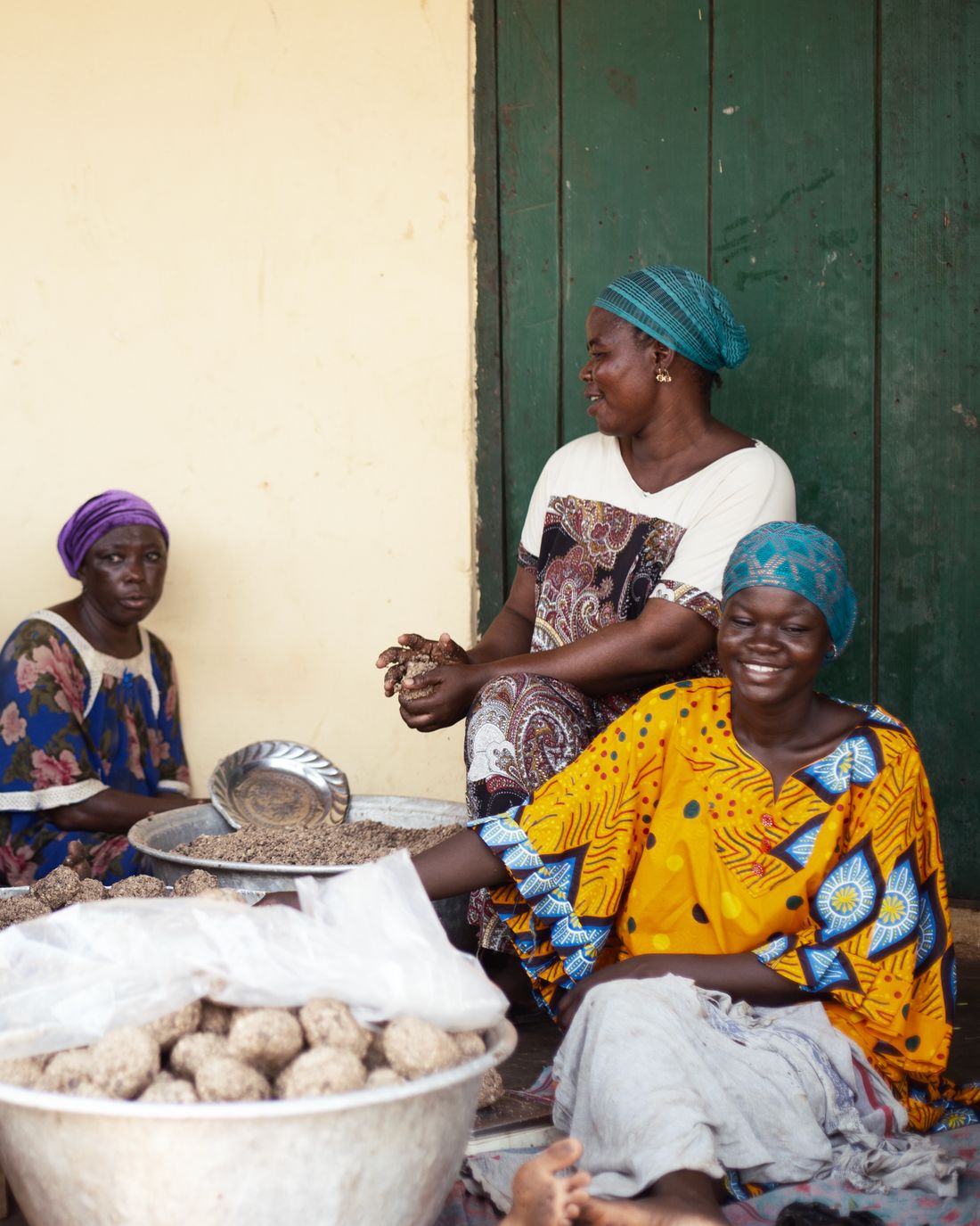 Traders working together outside a building in Tamale, northern Ghana.